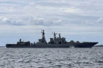 NATO member country accuses Russian warships of pointing weapons at helicopters and naval ships